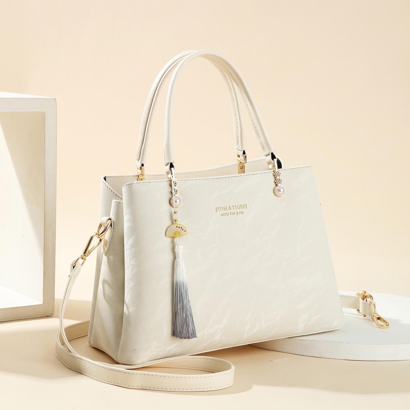 

Женская большая сумка с высоким чувством, модная в иностранном стиле, женская сумка, универсальная, большой вместимости, мессенджер, темперамент, сумка для светской львицы