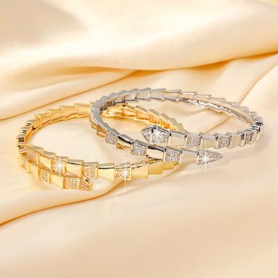 Hochwertiges Zirkon-Serpentin-Öffnungsarmband für Damen im leichten Luxus-Modestil