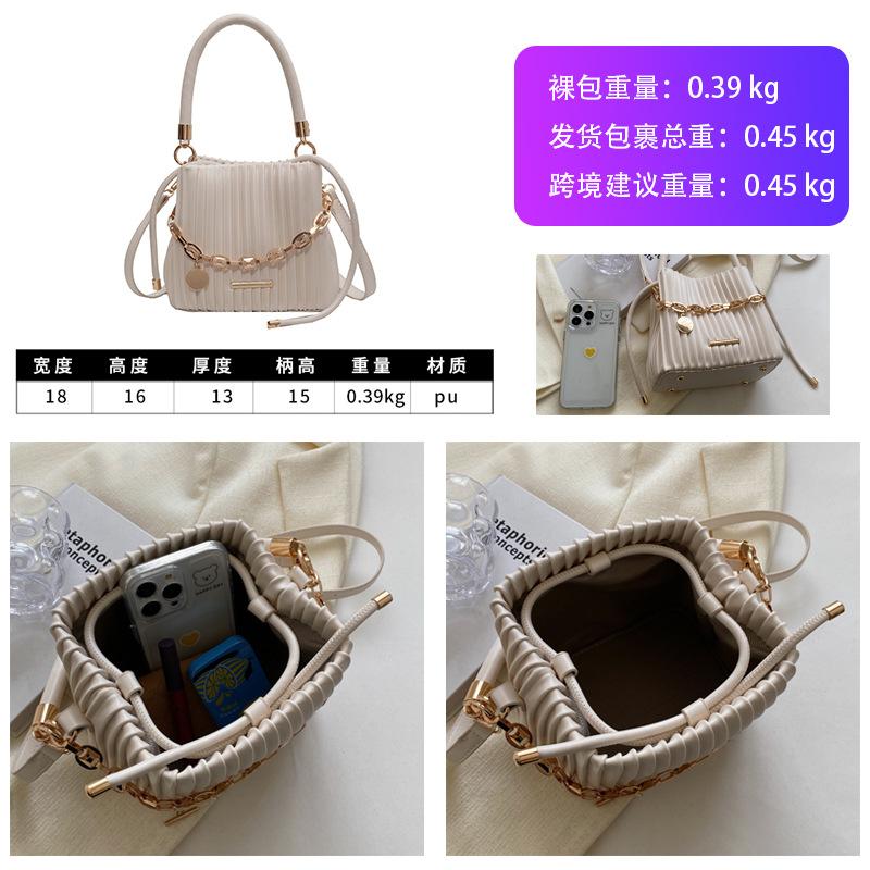 High-end niche design bucket bag, new versatile pleated messenger bag, handbag bag, women's handheld.