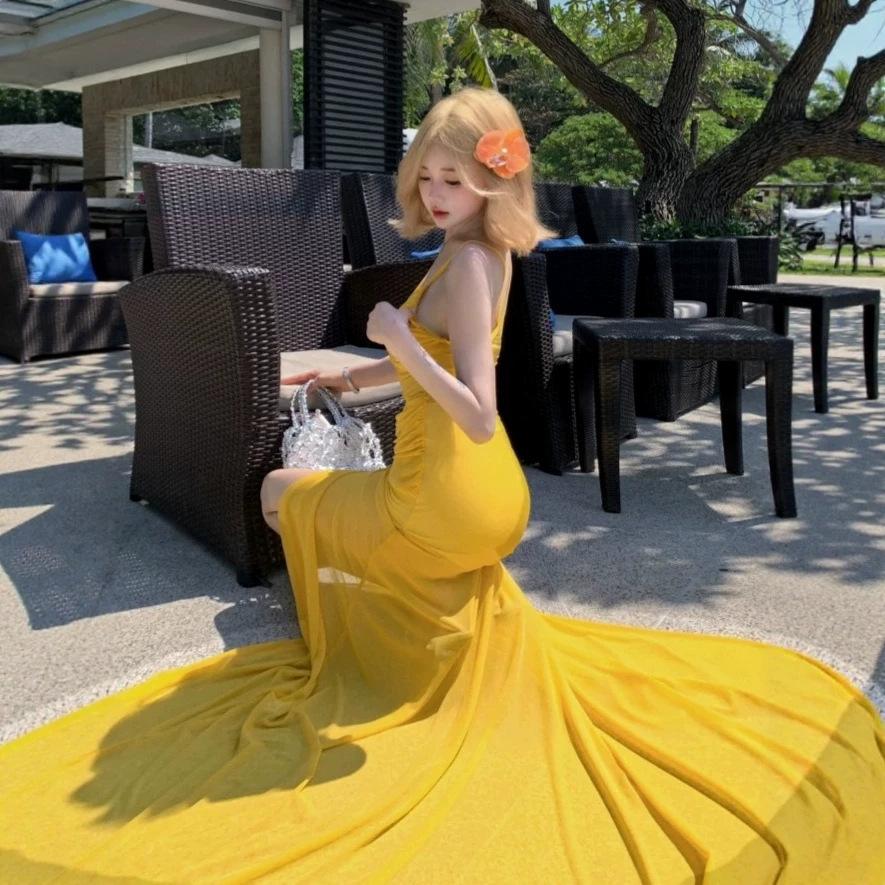 Vacation style Spice Girl yellow suspender dress women's summer pleated slim fishtail dress design sense mesh skirt
