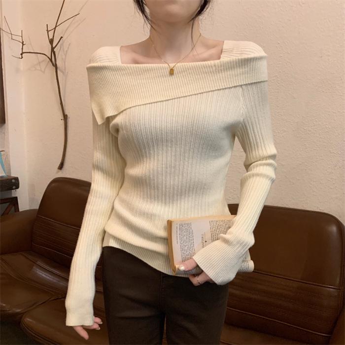 Women's Irregular One-Shoulder Knit Base Layer Top with Collarbone Design, Long Sleeves, and High-Waisted Fit for Spring and Autumn.
