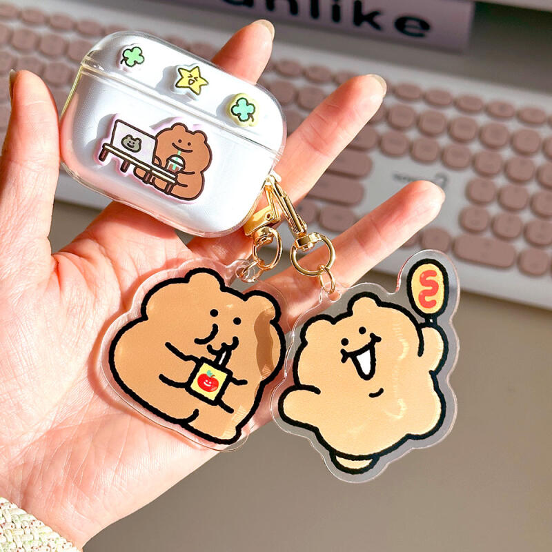 29 random acrylic keyrings in a box