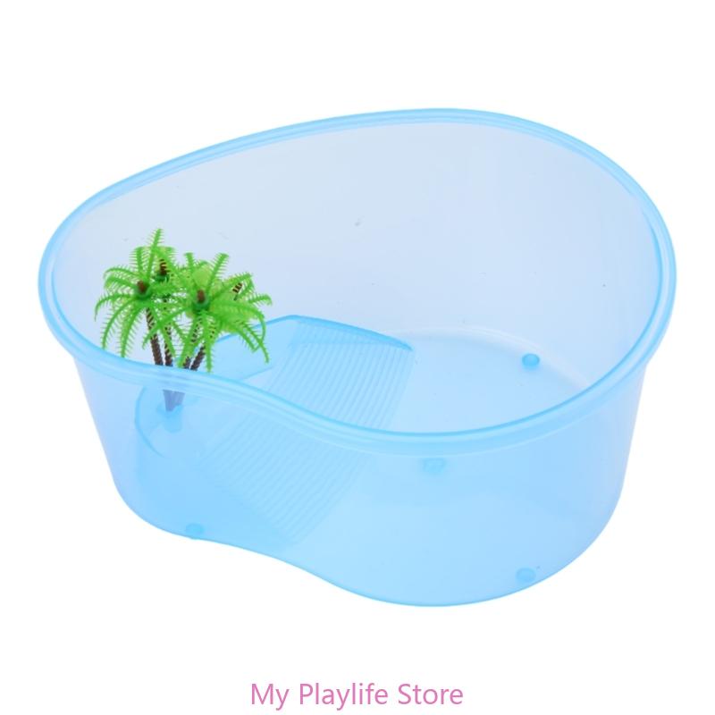 

Маленький террариум из прозрачного пластика, оборудованный островными деревьями для головастиков синий