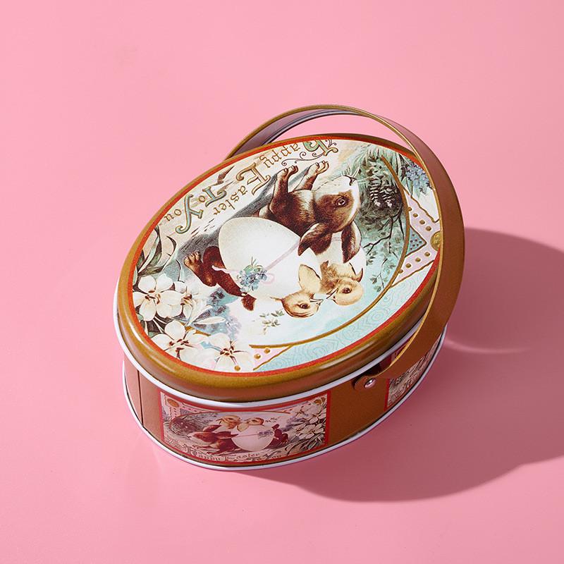 Oval Whimsical Easter Handheld Iron Box With Cheerful Rabbit And Egg Pattern Ideal For Childrens Gifts