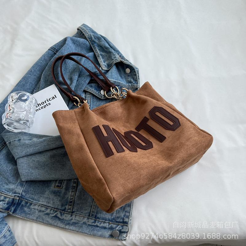 Summer fashion explosion commuter big bag women 2025 new trendy foreign style canvas bag large capacity tote bag