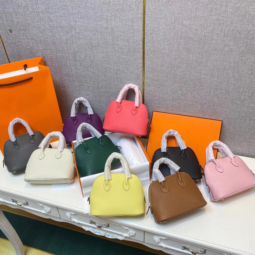 Kann mit Shell Bag Lychee Muster Togo Rindsleder Einzel Schulter Diagonal Kreuz Hand-gehalten Leder Frauen Stil Mode Klassische Frauen Stil beschriftet werden