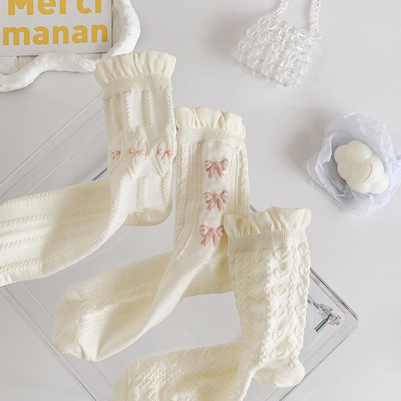 Chaussettes blanches simples, polyvalentes, jolies, nœuds papillon, petites fleurs, chaussettes tube moyennes pour femmes, Kawaii Harajuku Jk Lolita, chaussettes en coton pour filles