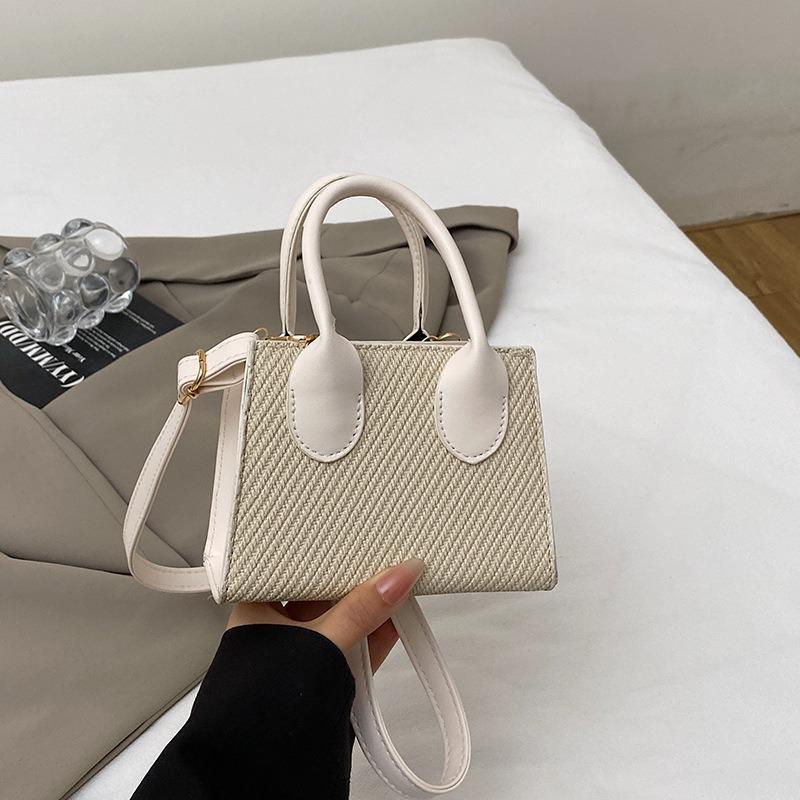 Sommer neue Tasche Damenmode einfache Umhängetasche tragbare kleine quadratische Tasche Damentasche lässige Pendler Umhängetasche