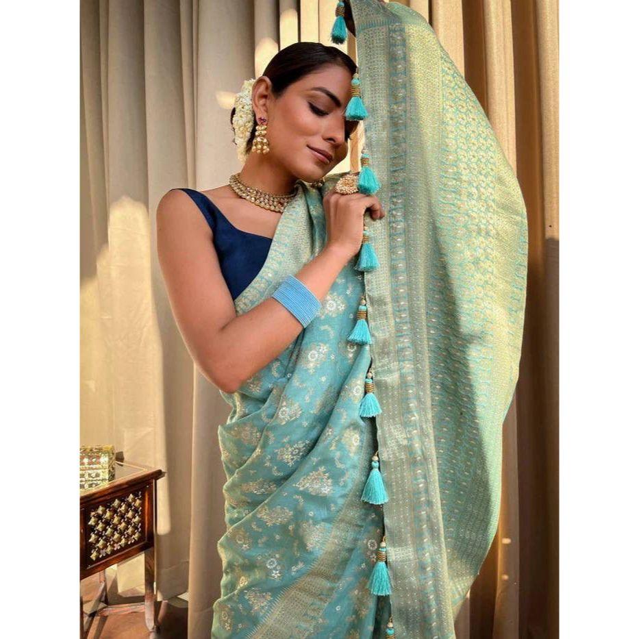 Silk Saree from the ALMAARI Store Is Adorned with Beautiful Zari Work In Form of Traditional Motifs.
