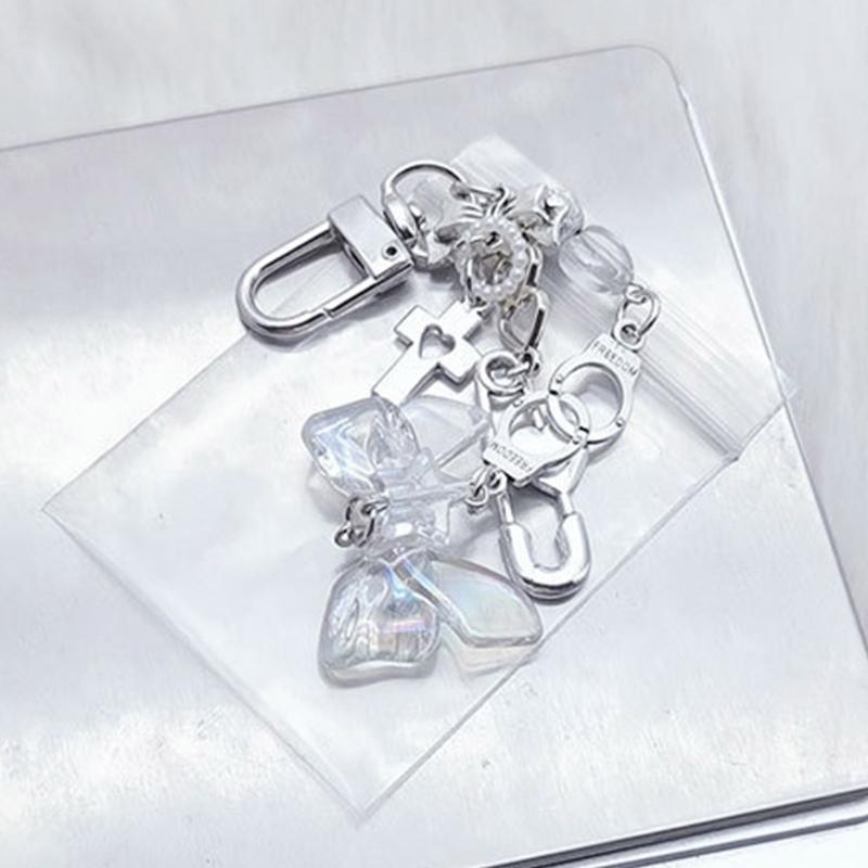 Modische Schleife Schlüsselanhänger Süß Cool Kreuz Perlen Schlüsselanhänger für Damen Tasche Schmuck