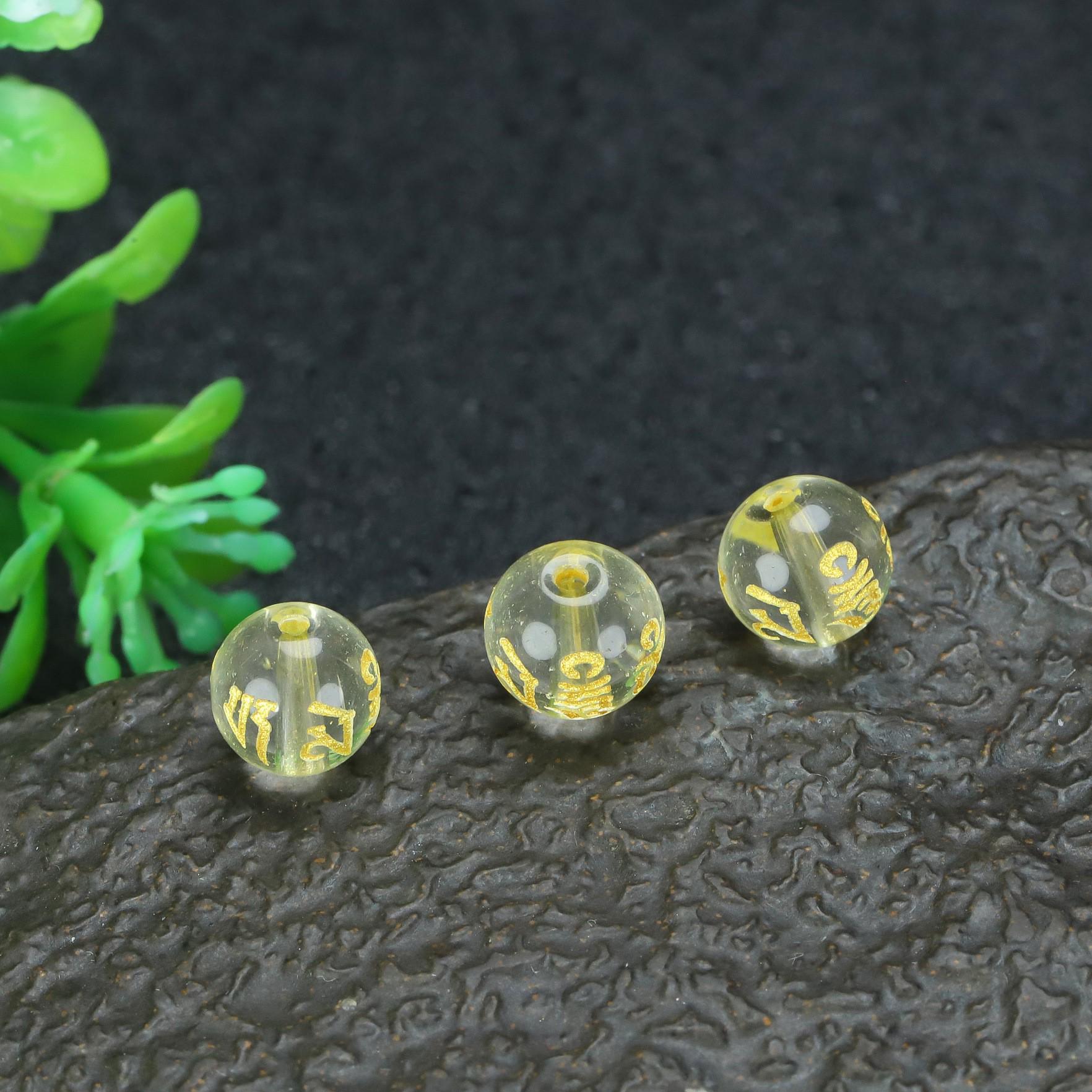 

Six-Character Mantra Crystal Bead Bracelet with Black, White, Red, Green, and Yellow Spacer Beads. 12mm/Approx. 30 beads білий