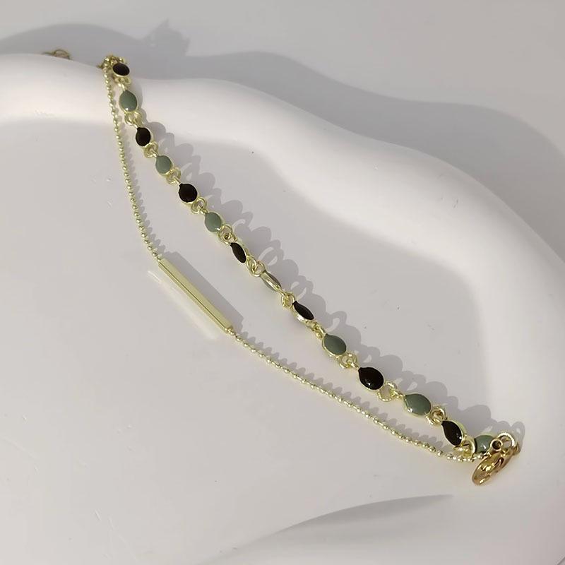 French Retro Double-Layer Bracelet: Stylish Light Luxury Bangle for Women.