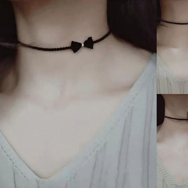 

Ожерелье-чокер из плетеной вручную ленты с бантами, цепочка для ключиц, женское, легко сочетается, гипоаллергенное, короткое ожерелье из черной веревки, аксессуары для шеи Default