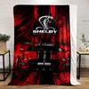 A bold red racing theme with a Shelby Cobra logo and a GT500 car. for all seasons blanket lunch break throw gift