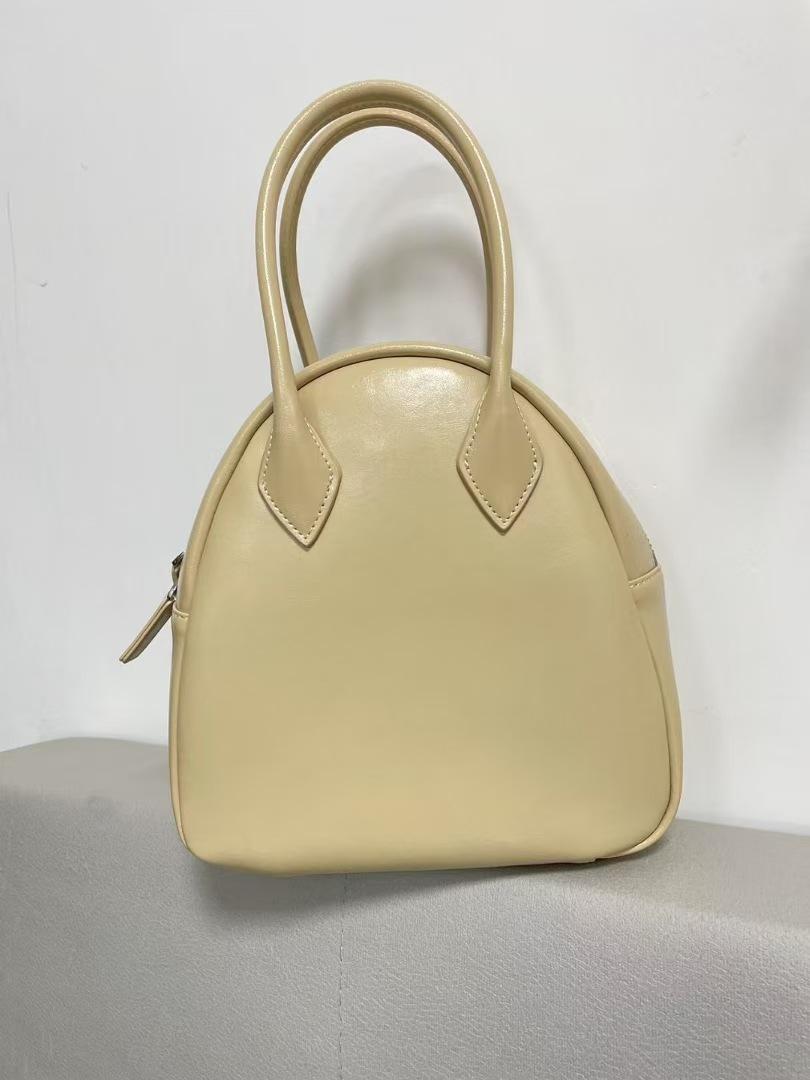 

Spring and summer new shell bag fashionable retro portable leather small bag women s versatile cute messenger bag світло-жовтого кольору