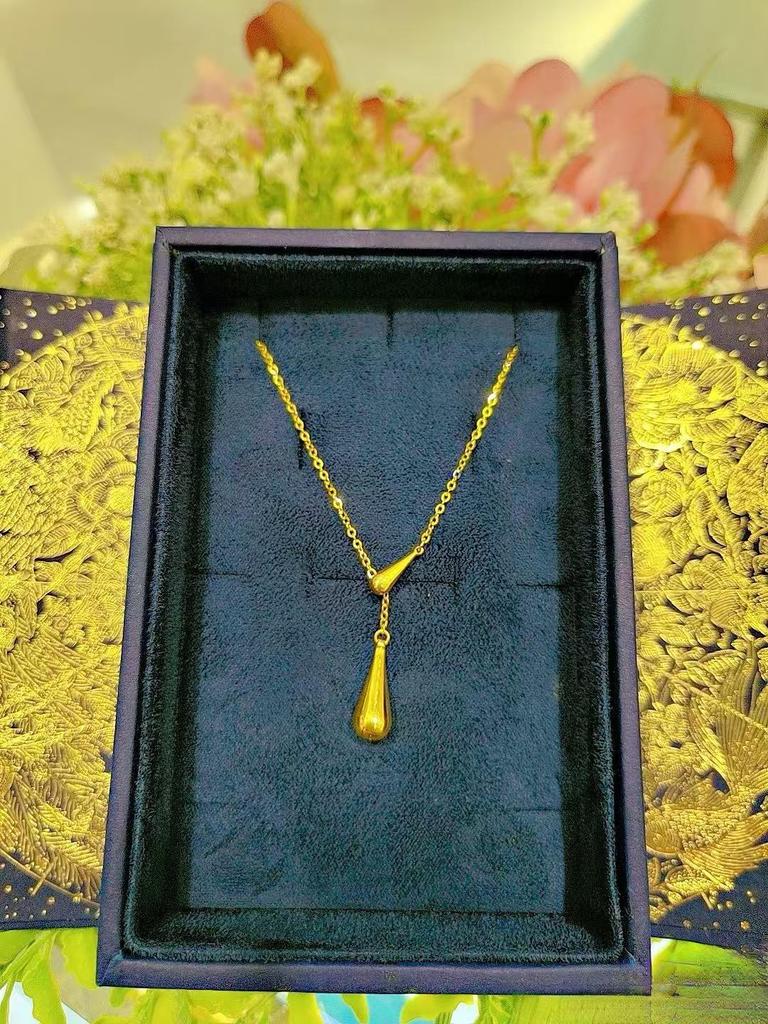Collier pendentif Tournesol Goutte d'Eau Doré pour Femmes - Tendance, Chaîne de Clavicule Polyvalente avec Pendentif Gland