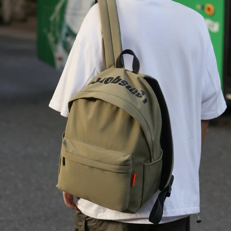 Backpack male college student fashion large-capacity schoolbag female high school student travel lightweight large-capacity computer backpack tide