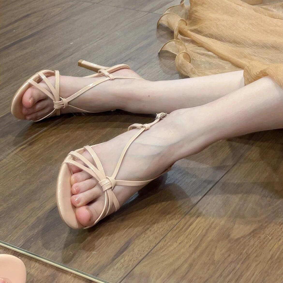 

Nude high heels women s spring and summer 2025 new thin heels sexy French Roman cross word with high heels sandals 35