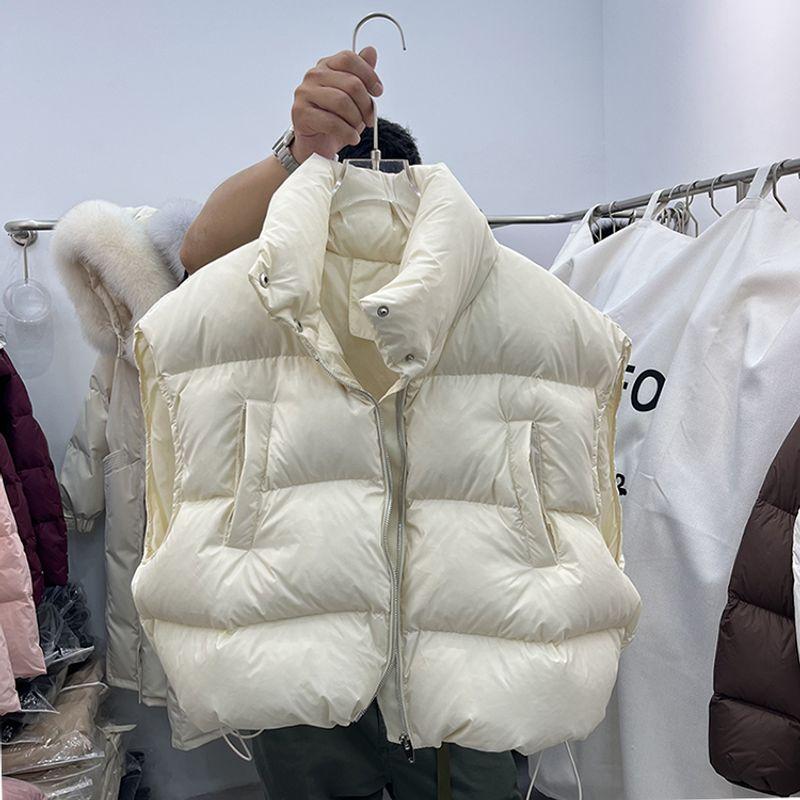 

Осень и зима 2024 Новое поступление Южная Корея Дун Дэмун Стойка воротник пуховый жилет Женский короткий свободный утолщенный жилет верхняя одежда кардиган Beige S