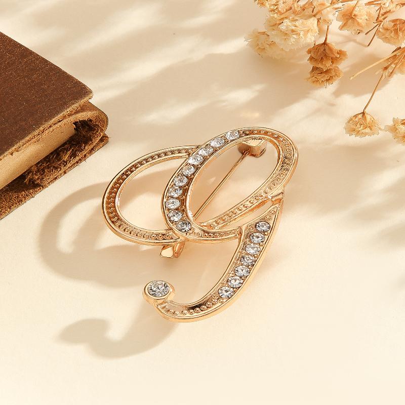 Kvinnor A-Z Bokstav Brosch Strass Kristall Guldfärg Engelska Alfabetet Metallnålar Söt Brosch Smyckestillbehör Gåva