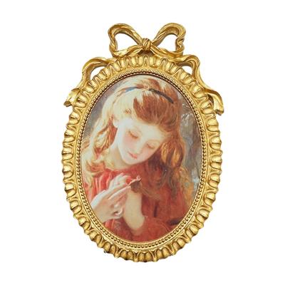 Handcrafted Antique Gold Carving Oval Bowknot Picture Frame With Hanging Hook And Stand For Wall Or Desktop Decoration
