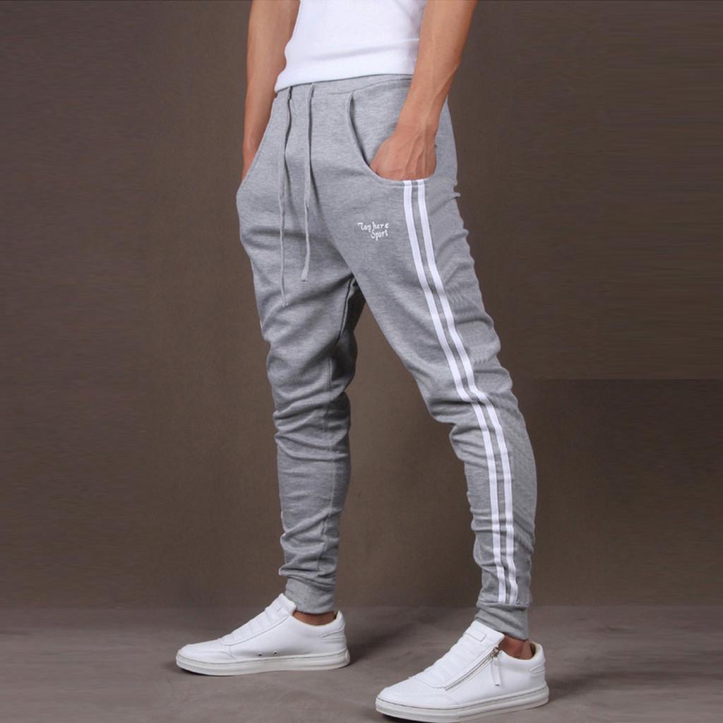 Заузить спортивные брюки. Штаны Jogger bottom 2021. Брюки спортивные мужские свободного покроя. Белые треники мужские. Свободные спортивные штаны мужские.