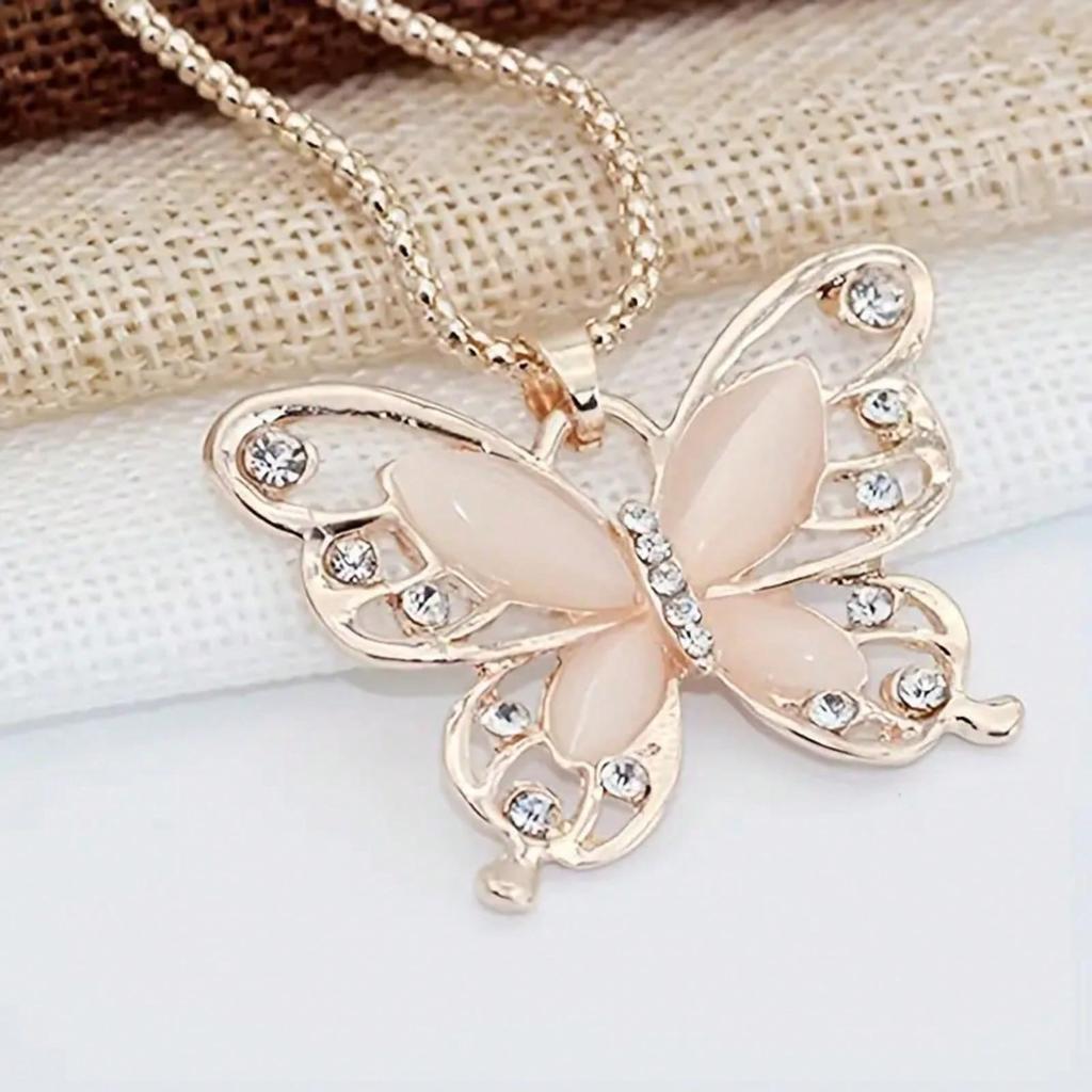 Stainless Steel Butterfly Pendant Necklace With A Rose Gold Faceplate, The Perfect Gift For Birthdays, Anniversaries, Or Casual Outfits.