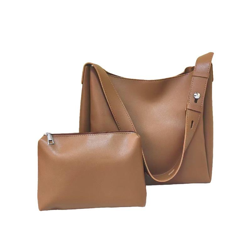 Large-capacity commuter bag women's spring new child and mother bag retro fashion soft leather shoulder bag portable tote bag