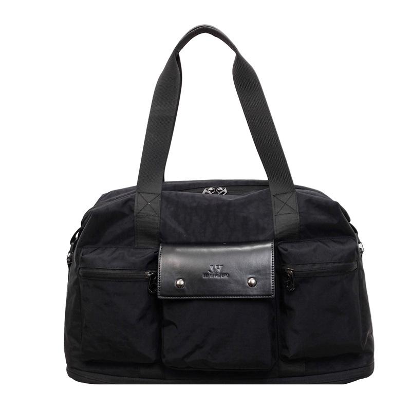 

Spacious Multi Compartment Duffel Bag with Reinforced Handles and Durable Water Resistant Nylon for Travel Gym and Daily Use чёрный