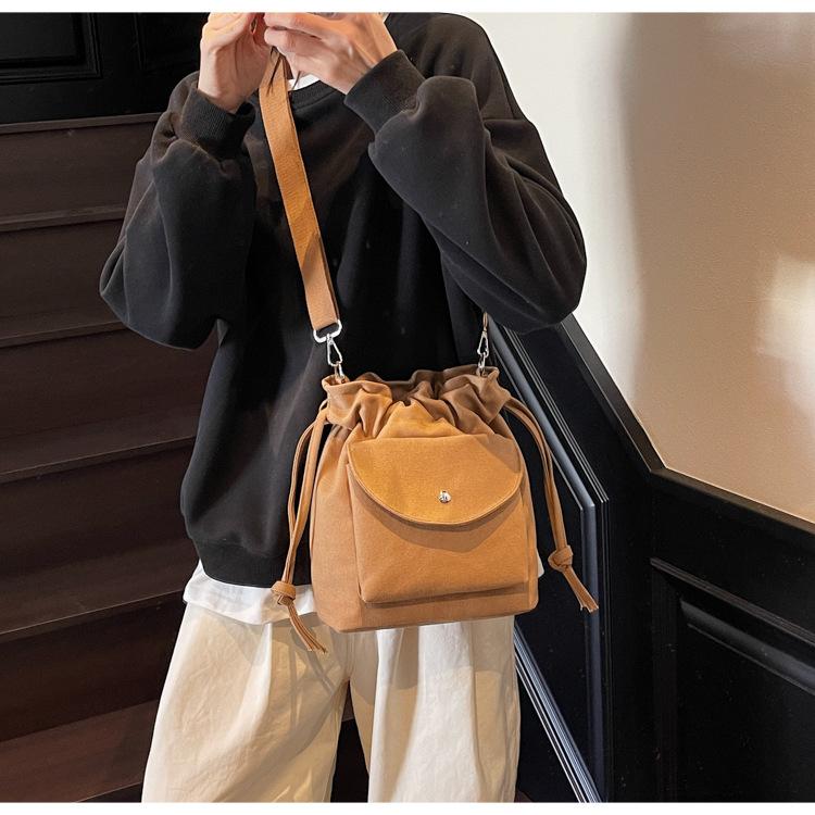 Canvas Bag Women's Spring and Summer New Niche Drawstring Shoulder Messenger Bag Pleated Bucket Bag