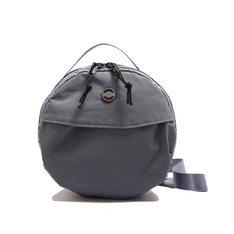 

2025 spring and summer new small round bag mobile phone bag shoulder messenger bag women s nylon cloth fashion versatile small satchel синий