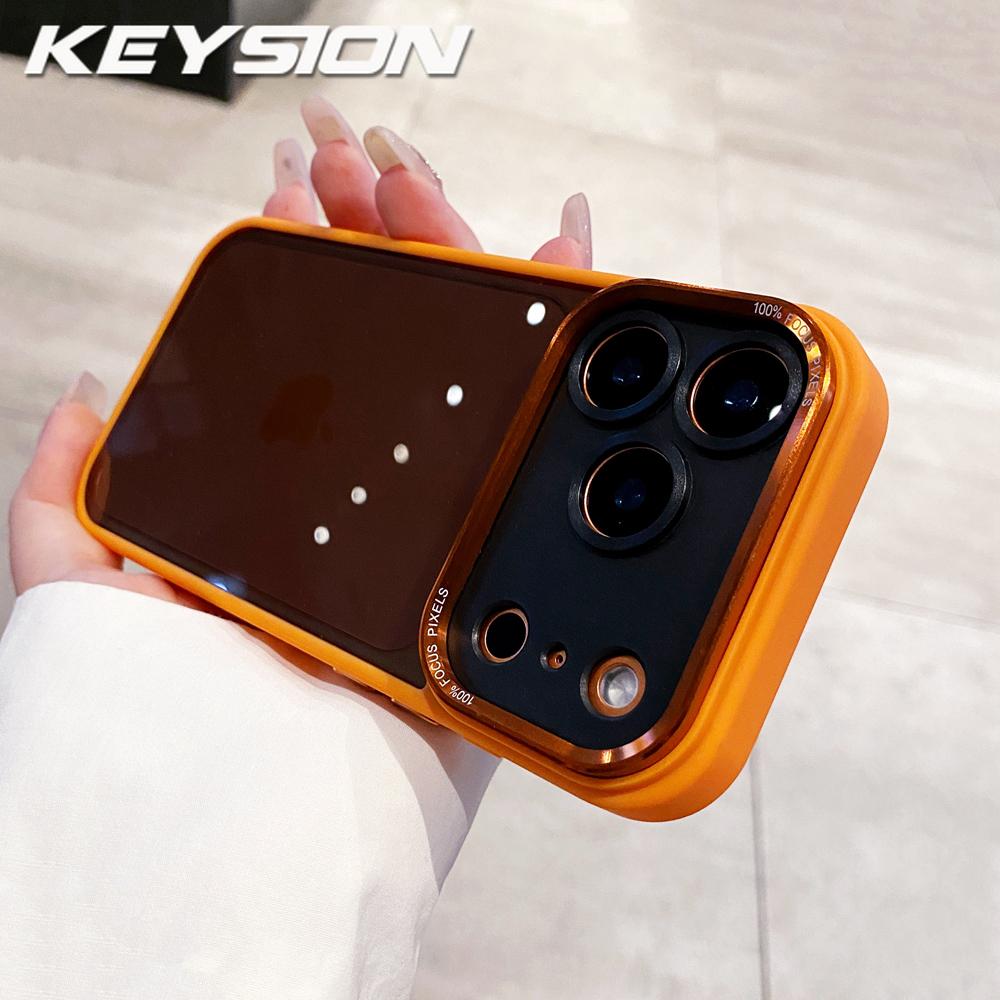 

KEYSION Transparent Acrylic Case for iPhone 16 17 Pro Max 16 Plus Soft Frame Metal Lens Protective Shockproof Cover for iPhone 17 Air for iPhone 17 Pro помаранчевий