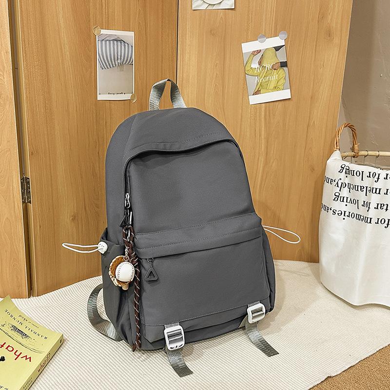 Japanese simple schoolbag female college student versatile junior high school student backpack male large capacity leisure travel backpack tide
