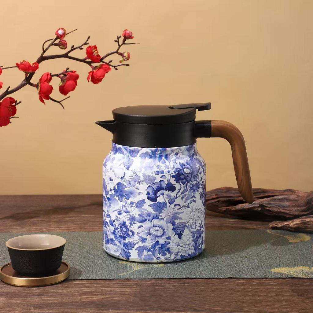 Insulated Stainless Steel Kettle with Tea and Water Separation - Elegant Chinese Style for Home or Office Use.
