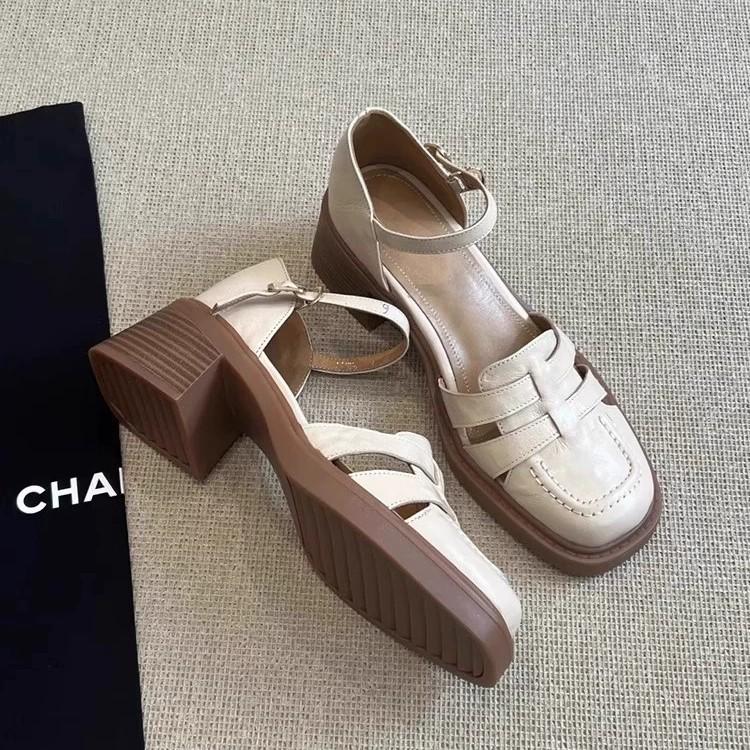 Retro woven hollow bag head Roman sandals women's soft sheepskin one-word buckle strap non-grinding feet soft sole high-heeled pig cage shoes