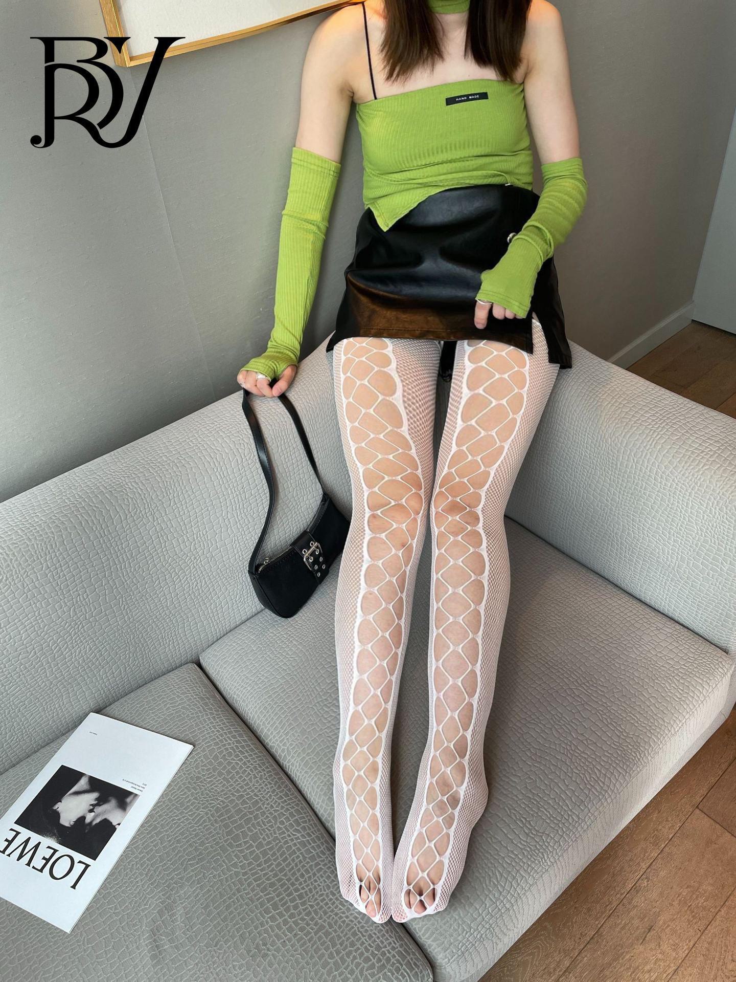 

Чорні ажурні колготки з підтяжками Large size білий