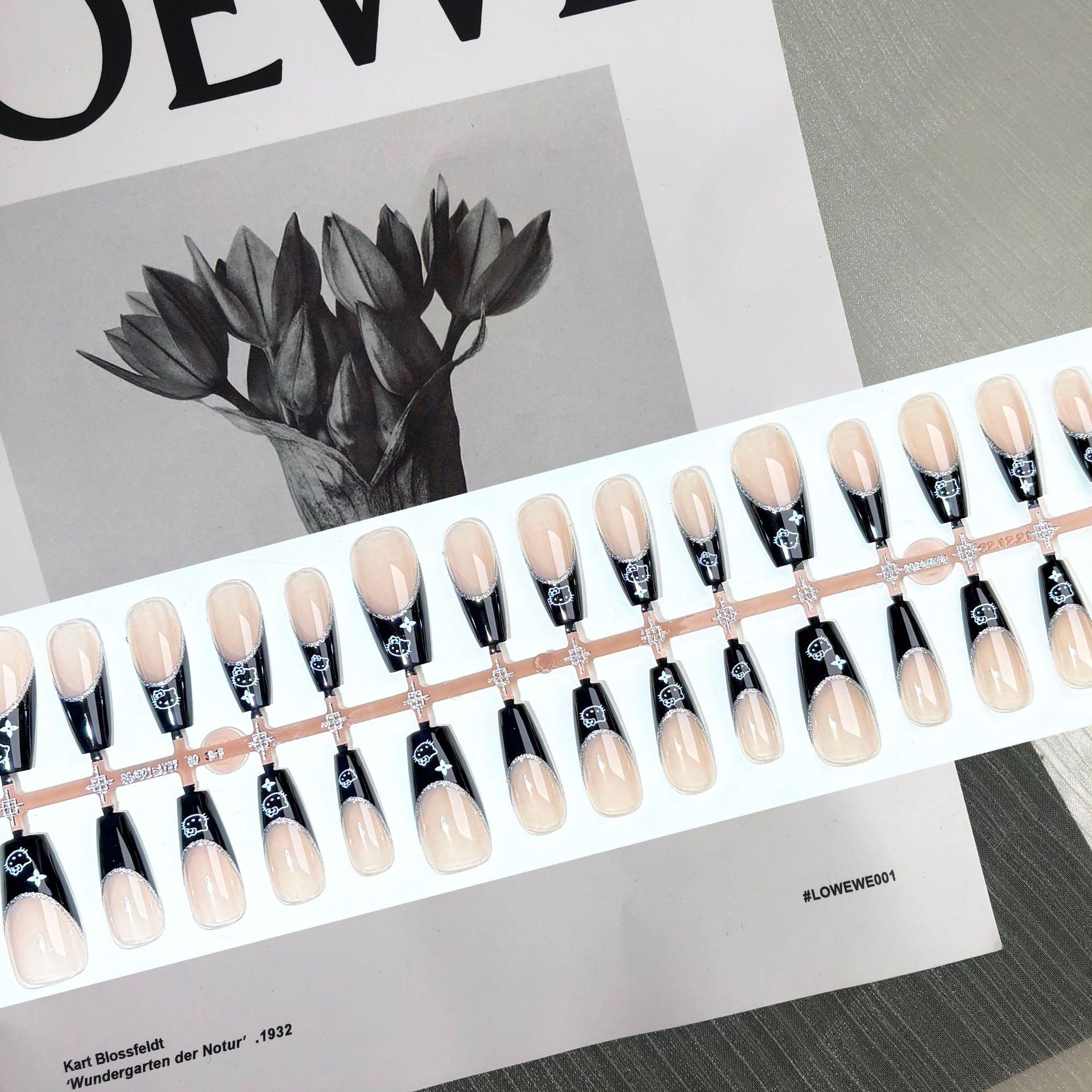 

Ногти-накладки Y2K черные с французским котиком и пикантными арт-наклейками - средней длины, форма гроб