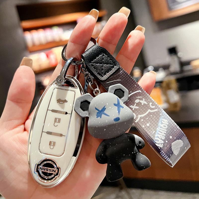 

Подходит для комплекта ключей Nissan Qijun Всеобъемлющая пряжка для автомобиля Tule Loulan Teana Bluebird Xuanyi высококлассный защитный чехол-пряжка