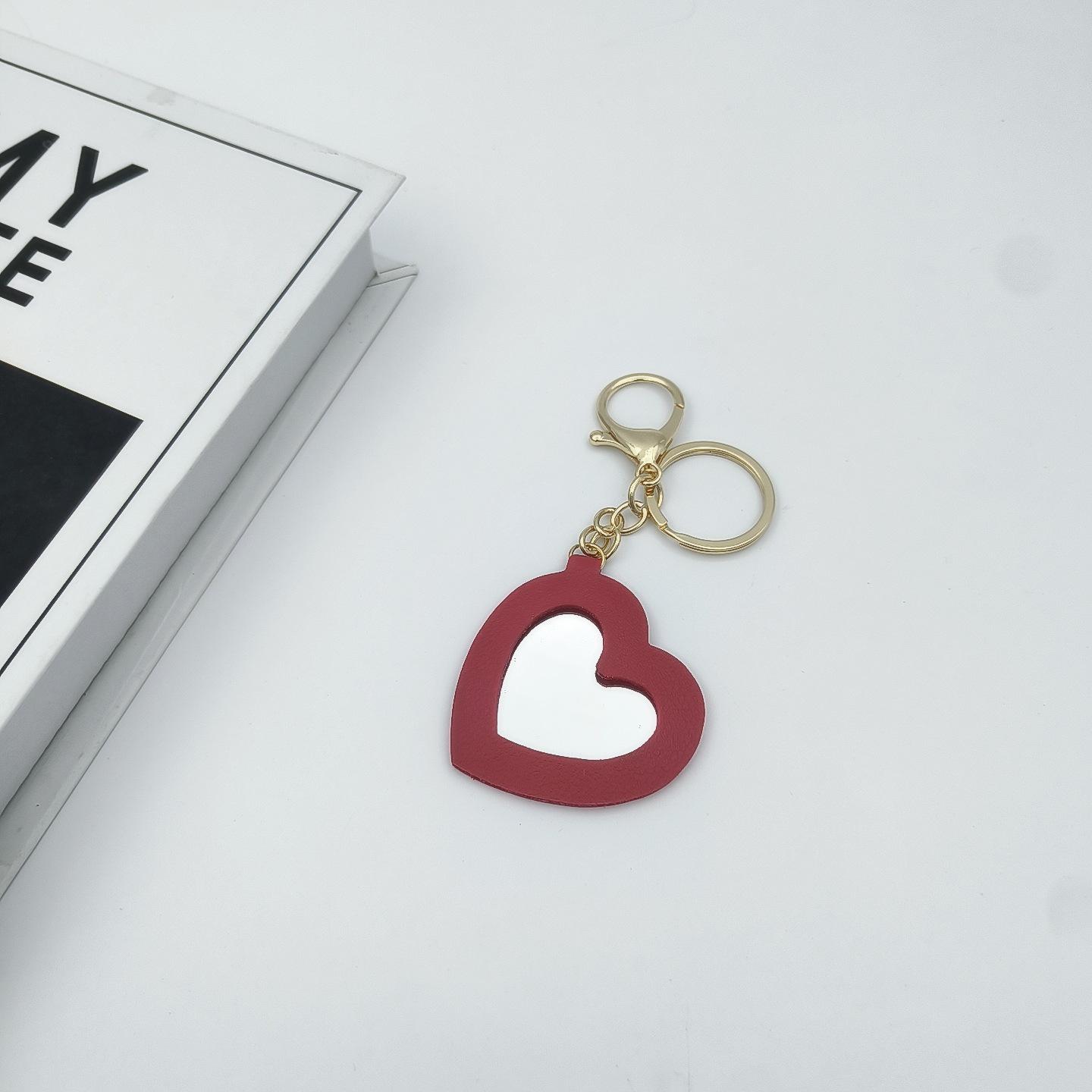

Trendy PU Leather Mini Keychain Heart Mirror & Lipstick Storage Bag