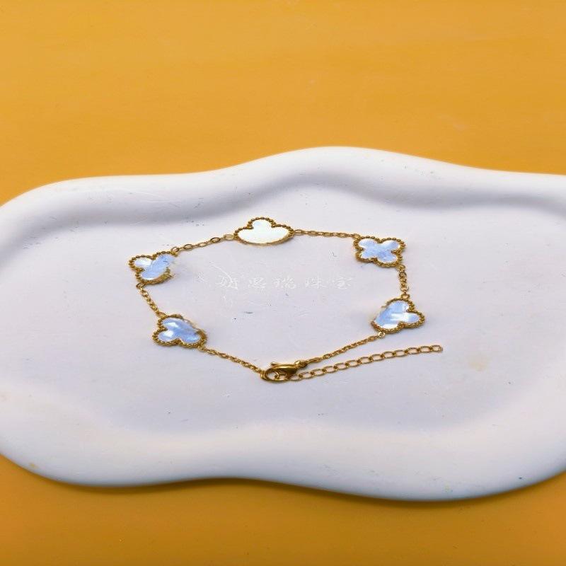 Luksusowa dwustronna bransoletka z koniczyną z masy perłowej dla par, galwanizowana 18-karatowym złotem z wykwintnym wykonaniem.