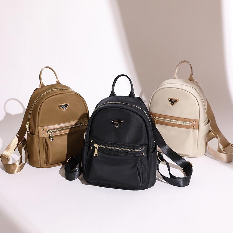 Koreanische Version des täglichen leichten Studentenrucksacks Neuer vielseitiger und modischer Damenrucksack Oxford-Gewebe Pendeln Reise