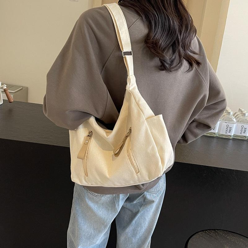 Simple Large Capacity Canvas Bag for Women New Casual Crossbody Dumpling Bag for College Students Fashionable One-shoulder Tote Bag
