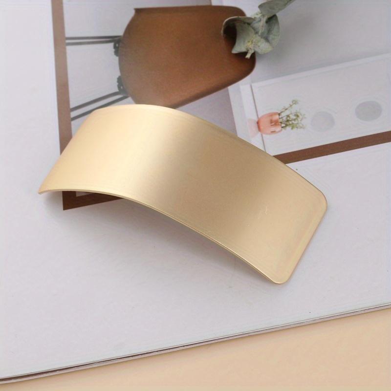 

Elegant Golden-Tone Wide Rectangular Metal Hair Clip with Leaf Detail - Vintage-Inspired, Curved Spring Design for Secure Hold - Chic Accessory