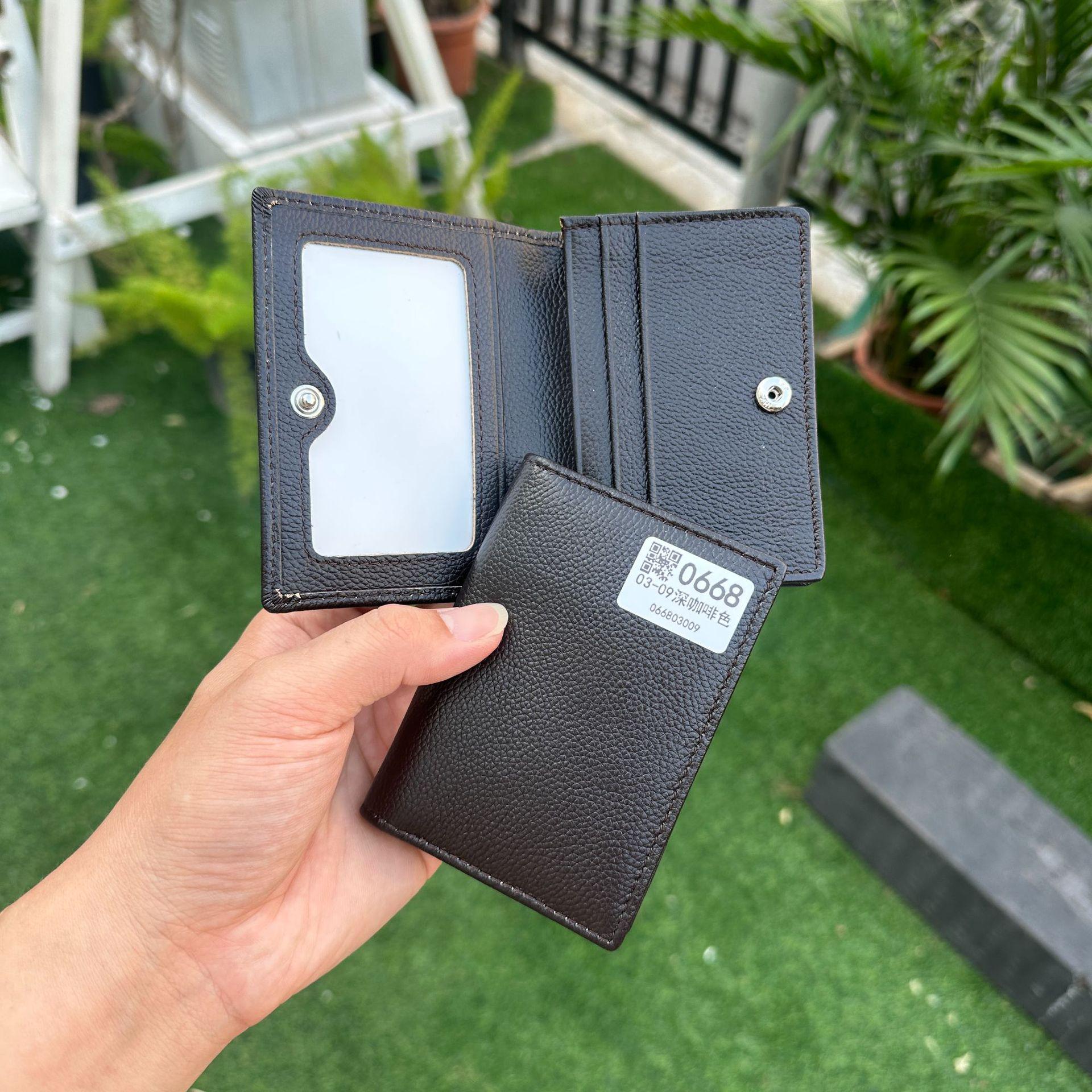 

Premium Leather Card Holder: Unisex Cowhide Business Case with Mirror Window, Snap Closure & Coin Purse. No specifications