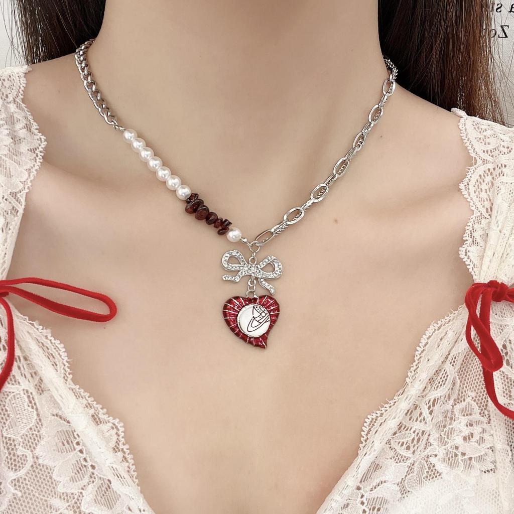 Queen Mother Saturn Pearl & Diamond Heart Necklace: Elegant High-End Sweet Cool Style with 3D Planet Design.