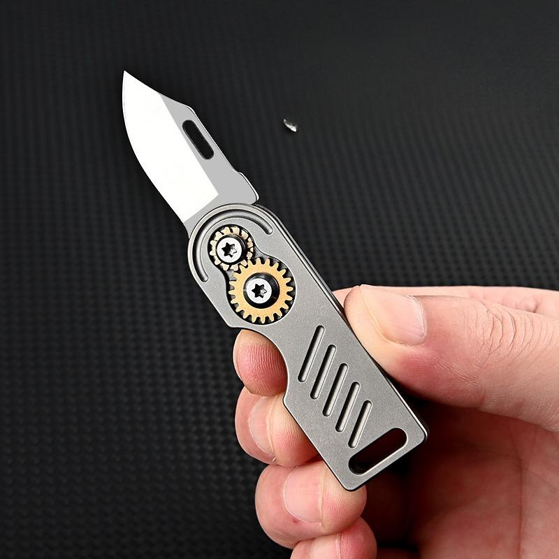 Titanium Alloy Multifunctional Keychain Mini Folding Knife Opening Unpack The Package Tool D2 Steel Portable Hand in Hand Tool