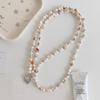 Bronze Shell Phone Case with Crossbody, Shoulder Chain, Wrist Lanyard & Pearl Pendant.
