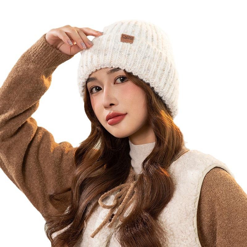 Small leather label dot knitted warm hat women's winter pullover ear protection cycling hat outdoor knitted straight hat