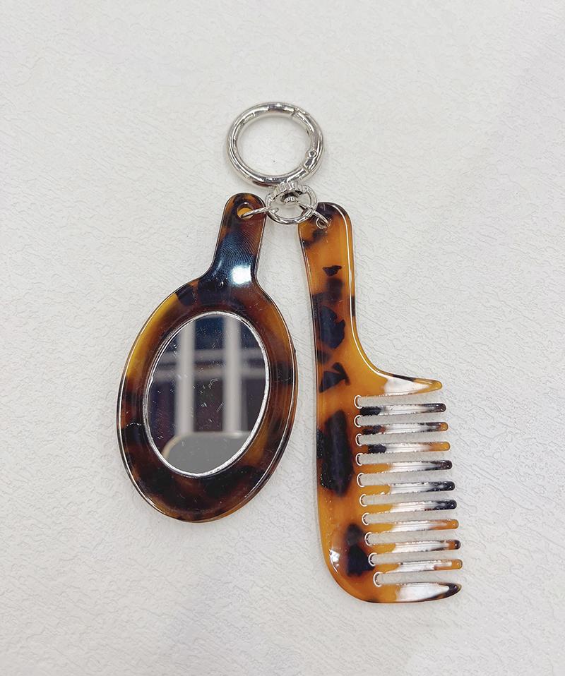 Neuankömmling Kreativer Harz-Kamm Schlüsselanhänger Essigsäure Spiegel Kammform Anhänger Schlüsselring Frauen Täglicher Gebrauch von Taschenzubehör