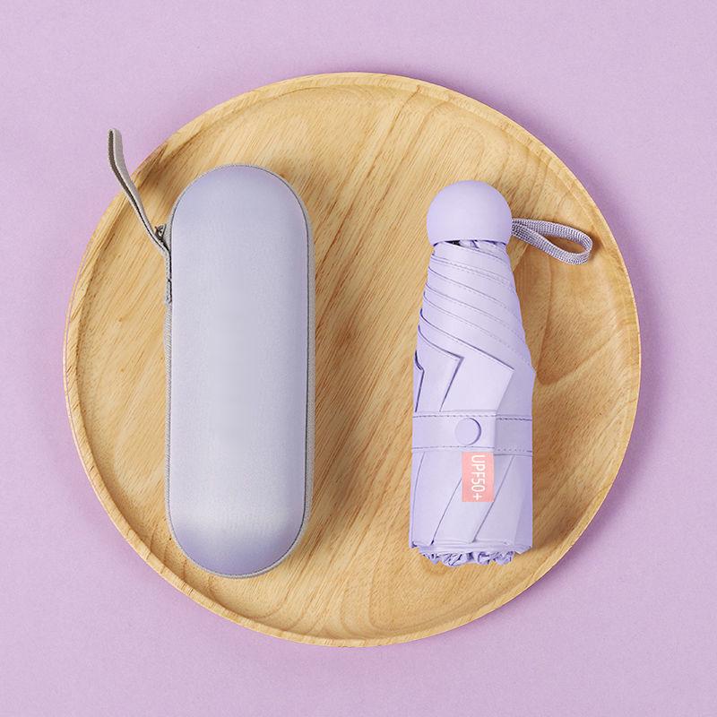 Parasol Capsule Sun Umbrella: 50% Off Mini UV Protection for Women, Dual-Purpose for Sun and Rain.